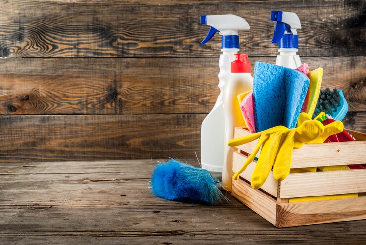 spring cleaning concept with supplies house cleaning products pile household chore concept rustic garden wooden background copy space 136595 10266